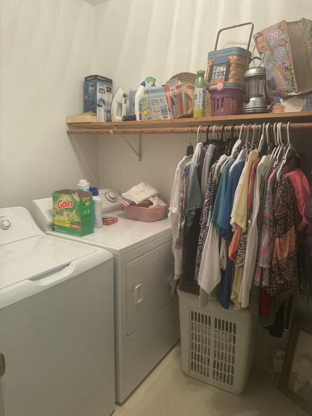 laundry area with independent washer and dryer