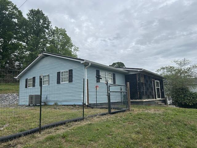 281 Webb Rd, Rogersville, TN 37857 - view of property exterior with central AC and a lawn