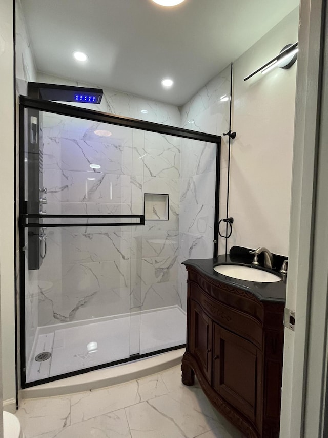 281 Webb Rd, Rogersville, TN 37857 - bathroom with marble look tile flooring, vanity, a marble finish shower, and recessed lighting