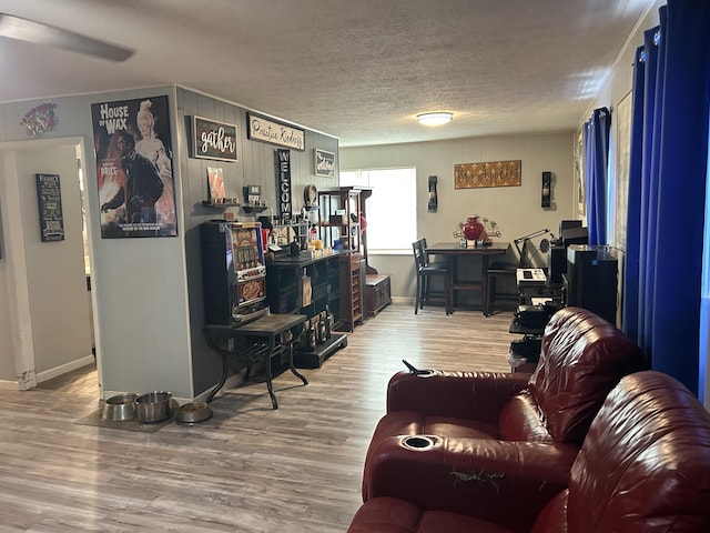 281 Webb Rd, Rogersville, TN 37857 - living room featuring wood finished floors, a textured ceiling, and baseboards
