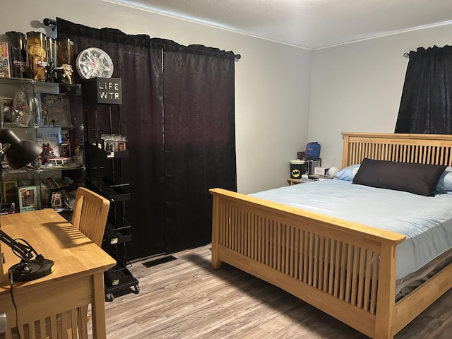 281 Webb Rd, Rogersville, TN 37857 - bedroom with wood finished floors and crown molding