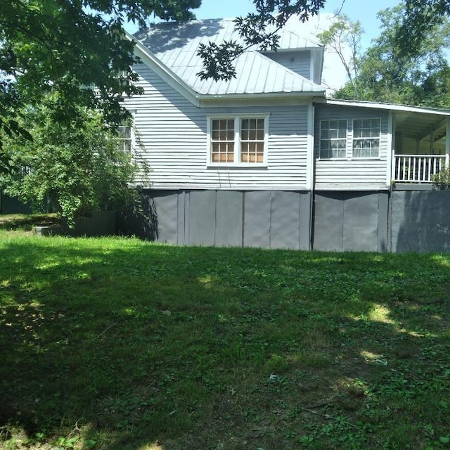 059/057.00 Spring Creek Rd, Dandridge, TN 37725 - view of side of property with a yard and metal roof