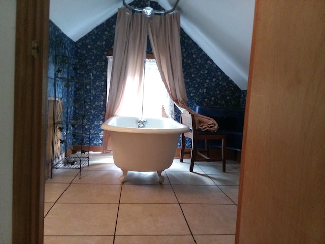 059/057.00 Spring Creek Rd, Dandridge, TN 37725 - bathroom featuring a soaking tub, tile patterned floors, lofted ceiling, and wallpapered walls