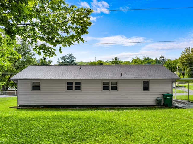 305 Hamilton Pl, Kingsport, TN 37663 - back of house featuring a lawn and roof with shingles