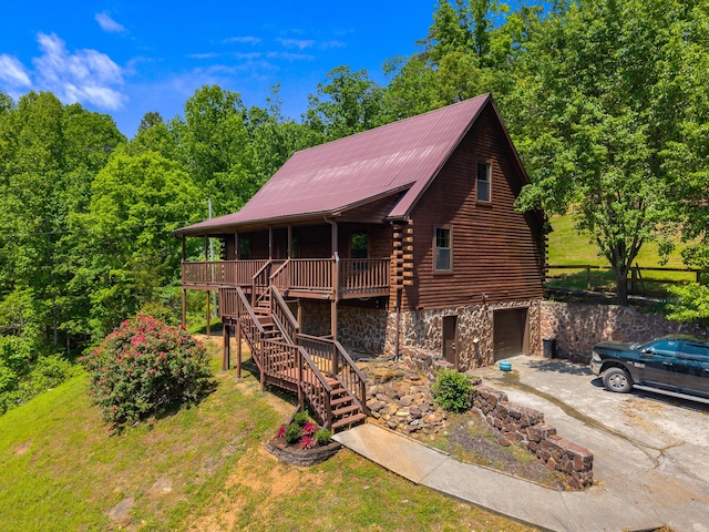 148 Delph Ln, Mooresburg, TN 37811 - log cabin featuring dirt driveway, log exterior, stone siding, a garage, and stairway