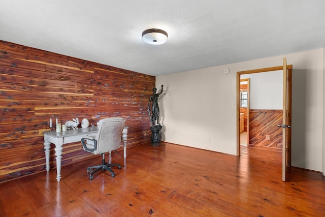 148 Delph Ln, Mooresburg, TN 37811 - home office featuring wooden walls, wood finished floors, and a wainscoted wall