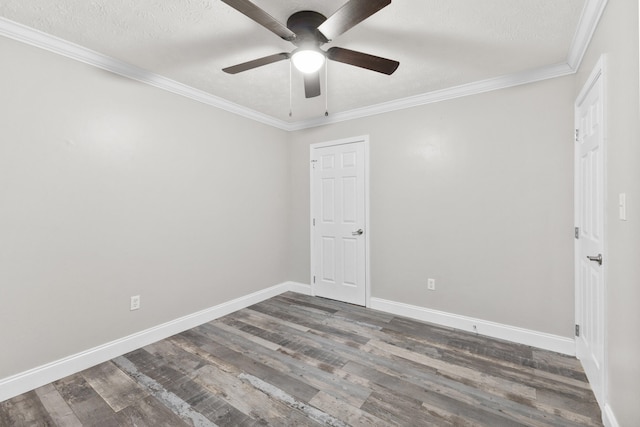 spare room with dark hardwood / wood-style flooring, ceiling fan, ornamental molding, and a textured ceiling