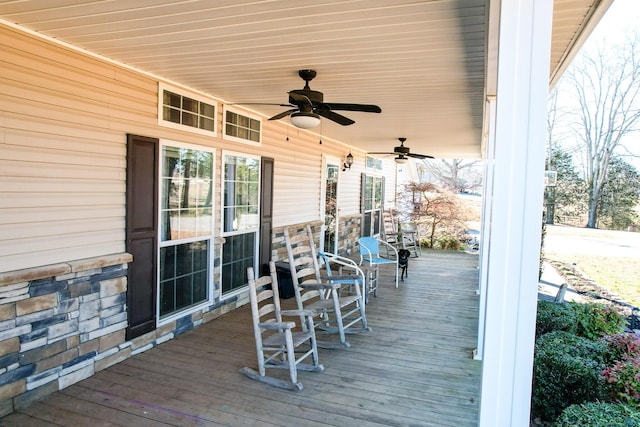 wooden terrace with a porch