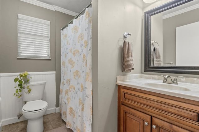 5700 Academy Dr, Morristown, TN 37814 - bathroom featuring toilet, vanity, ornamental molding, a wainscoted wall, and tile patterned floors