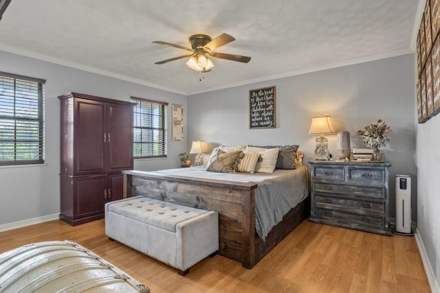 5700 Academy Dr, Morristown, TN 37814 - bedroom with light wood finished floors, baseboards, ceiling fan, and ornamental molding