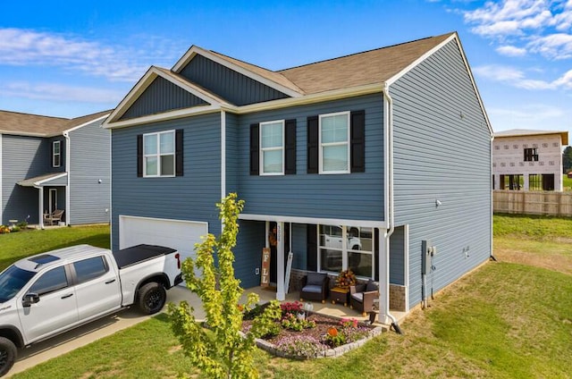 view of front facade featuring a garage and a front yard