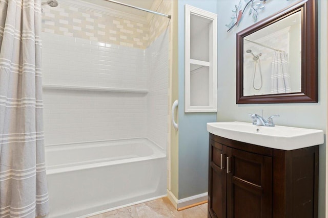 bathroom featuring shower / bath combo with shower curtain and vanity