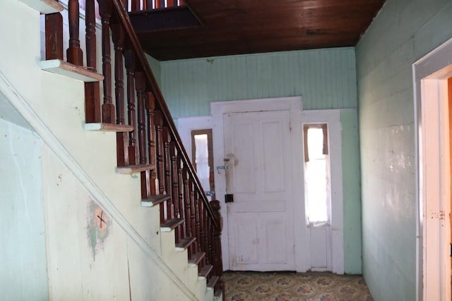 foyer with wooden ceiling