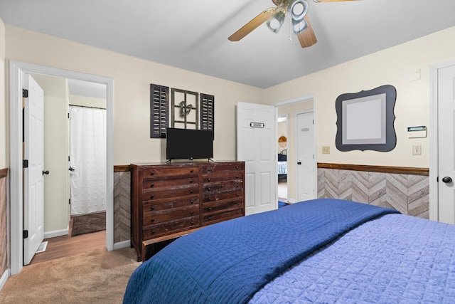 3912 Isaac Ave, Morristown, TN 37814 - bedroom with carpet floors, baseboards, ceiling fan, and connected bathroom