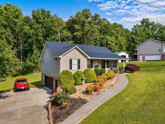 3912 Isaac Ave, Morristown, TN 37814 - view of front of property with an attached garage, a front yard, concrete driveway, metal roof, and covered porch