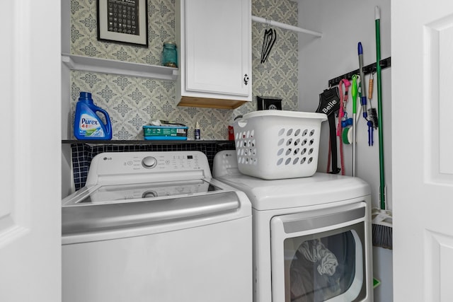 3912 Isaac Ave, Morristown, TN 37814 - laundry room with cabinet space and washing machine and dryer