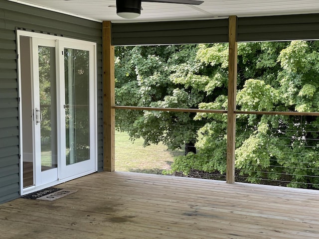 unfurnished sunroom with visible vents