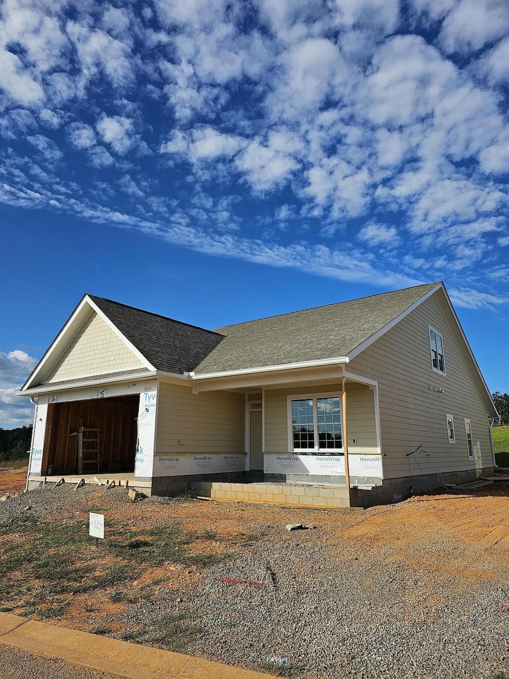 view of front of home featuring a garage and covered porch