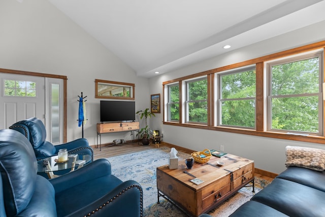 living room with recessed lighting, baseboards, high vaulted ceiling, and wood finished floors