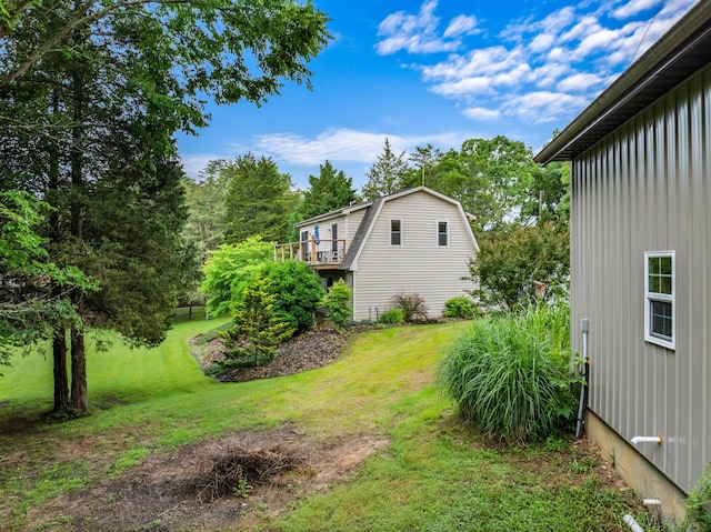 view of yard with a wooden deck