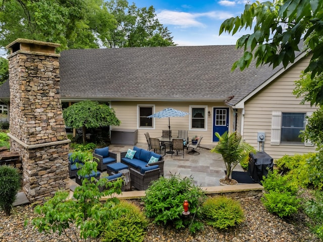 rear view of property featuring an outdoor living space, outdoor dining area, a patio area, and roof with shingles