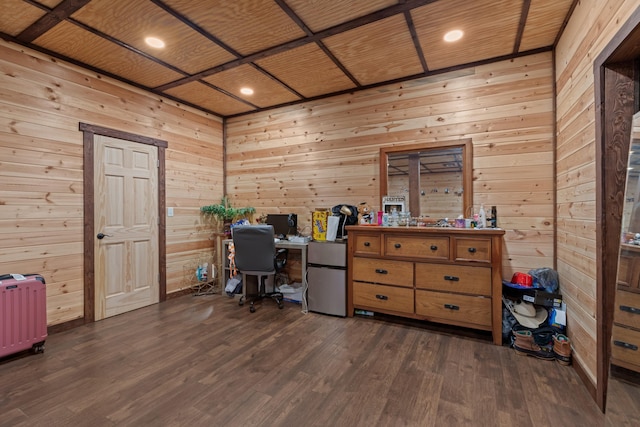 office area featuring dark hardwood / wood-style flooring, wooden walls, coffered ceiling, and wood ceiling