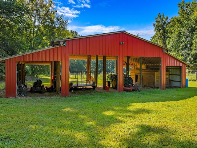 view of outdoor structure featuring a lawn