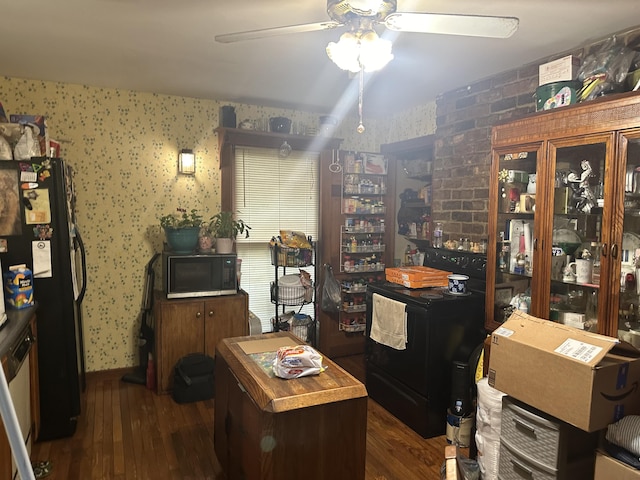 office featuring dark hardwood / wood-style flooring and ceiling fan