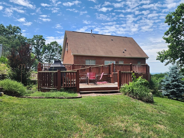 6237 Nightingale St, Morristown, TN 37814 - back of property featuring a deck, a lawn, brick siding, and roof with shingles