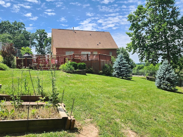 6237 Nightingale St, Morristown, TN 37814 - view of yard featuring a vegetable garden and a wooden deck