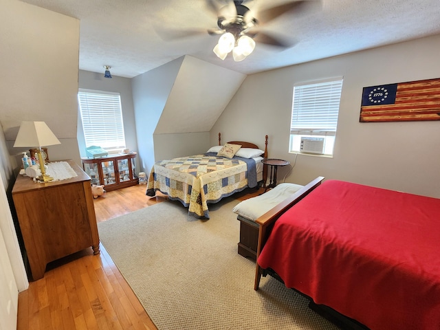 6237 Nightingale St, Morristown, TN 37814 - bedroom featuring light wood-style floors, cooling unit, a ceiling fan, and lofted ceiling