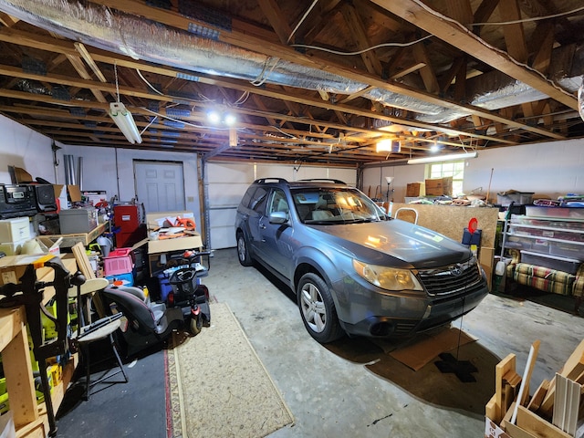 6237 Nightingale St, Morristown, TN 37814 - garage featuring a garage door opener