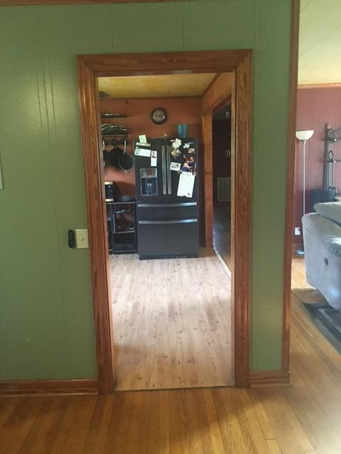 corridor featuring hardwood / wood-style flooring