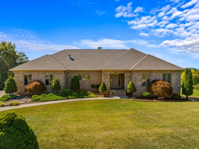 ranch-style house with a front lawn