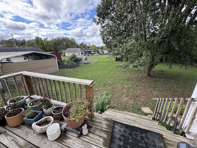 deck featuring a yard