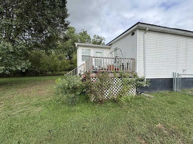 view of yard with a deck