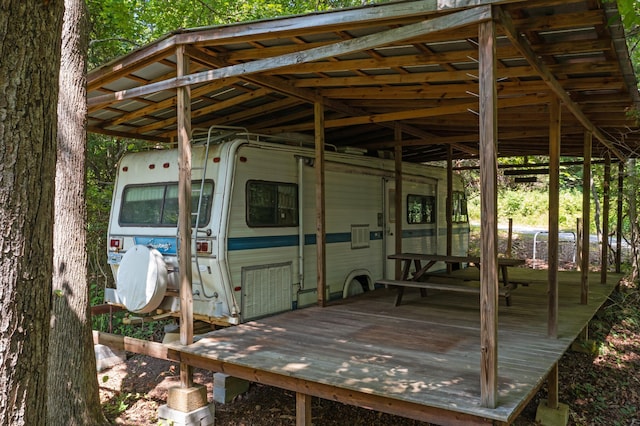exterior space with a carport