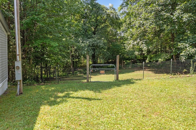 view of yard featuring fence