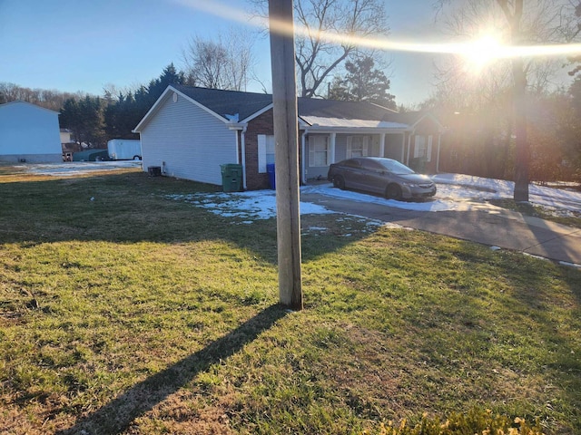 view of property exterior with a lawn