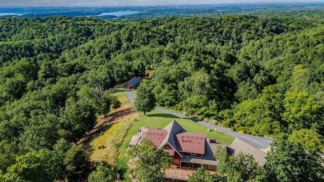 drone / aerial view of a heavily wooded area