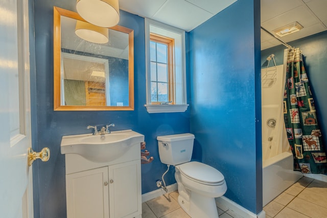 full bathroom featuring tile patterned flooring, vanity, shower / bath combination with curtain, and toilet