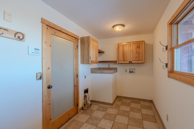 laundry room with cabinets, hookup for a washing machine, and electric dryer hookup