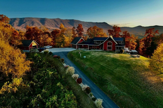 drone / aerial view featuring a mountain view