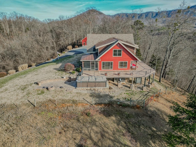 back of house featuring a mountain view