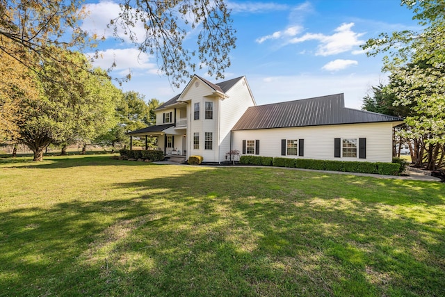 2940 Beecarter Rd, Dandridge, TN 37725 - rear view of property with metal roof and a lawn