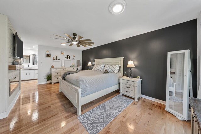 2940 Beecarter Rd, Dandridge, TN 37725 - bedroom featuring light wood finished floors, baseboards, and a ceiling fan