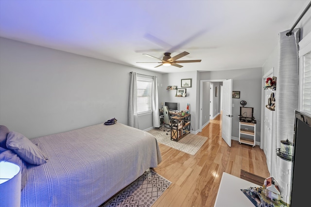 2940 Beecarter Rd, Dandridge, TN 37725 - bedroom with light wood-style floors, baseboards, and ceiling fan
