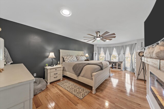 2940 Beecarter Rd, Dandridge, TN 37725 - bedroom featuring light wood-style flooring, baseboards, and ceiling fan