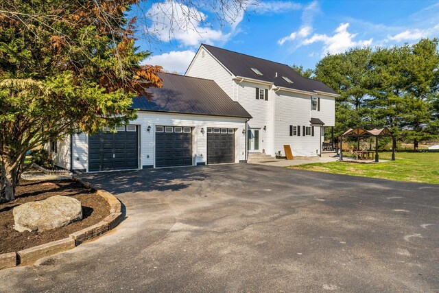 2940 Beecarter Rd, Dandridge, TN 37725 - view of home's exterior with driveway and a garage