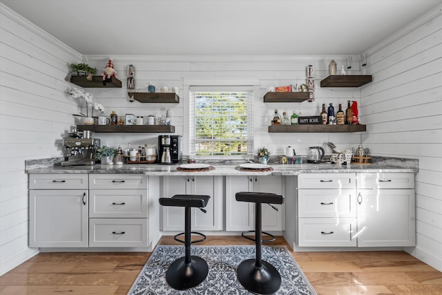 2940 Beecarter Rd, Dandridge, TN 37725 - bar with wooden walls, light wood-style floors, and wet bar